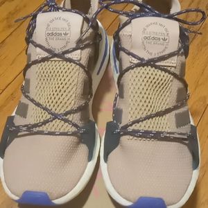 A pair of authentic Adidas sneakers